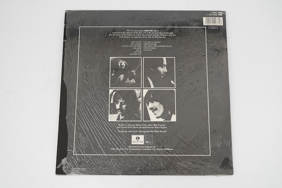 Three The Beatles LP record albums; Let It Be, PCS7096, With The Beatles, PMC 1206, XEX 447-1N, A Hard Days Night, PMC 1230, XEX 481-3N. Condition - fair to good